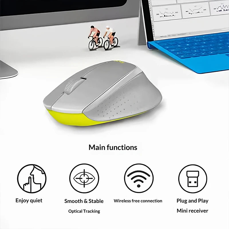 Gray and yellow computer mouse on a desk with a laptop and miniature figures in the background